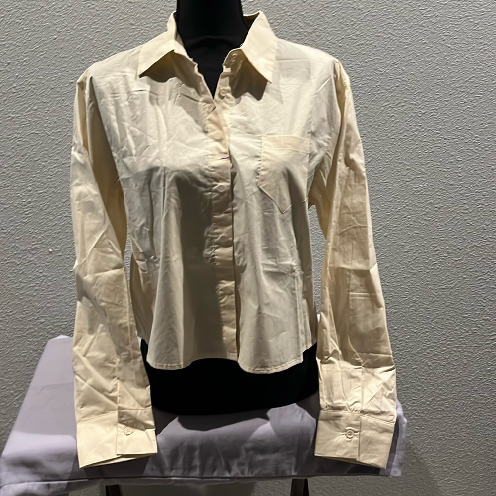 Cream colored know one cares blouse